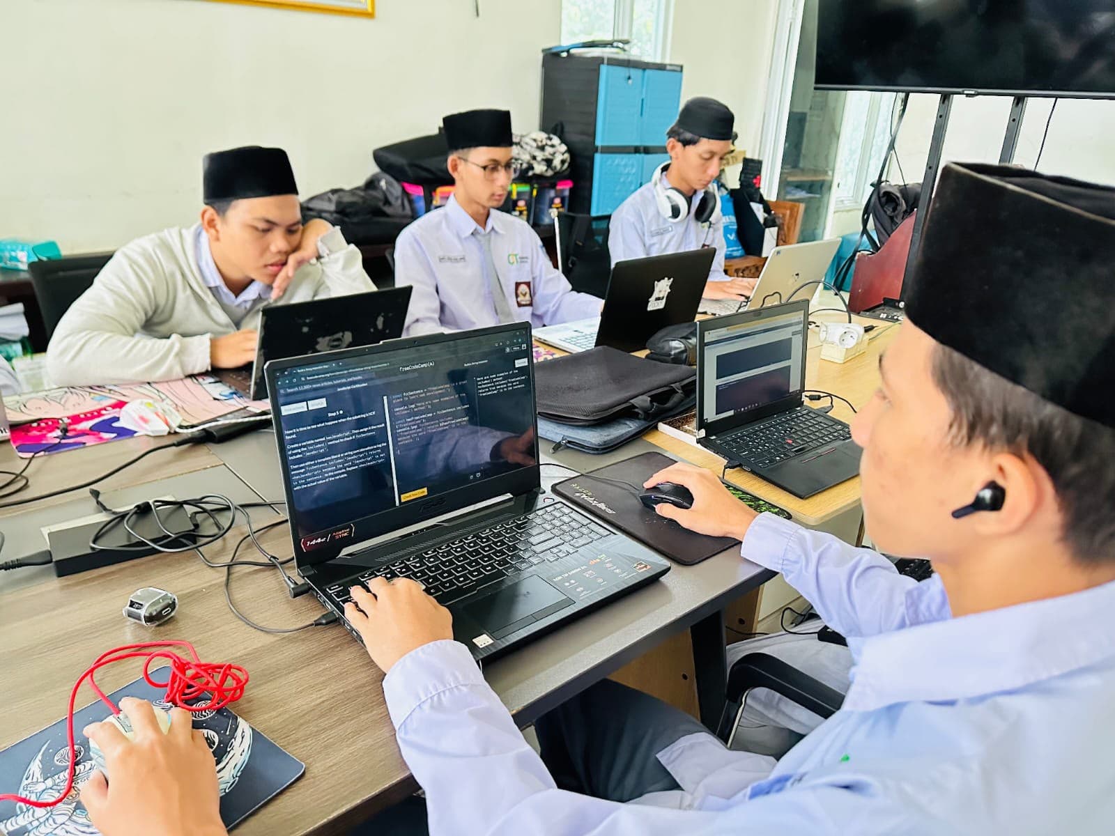 Students collaborating in class